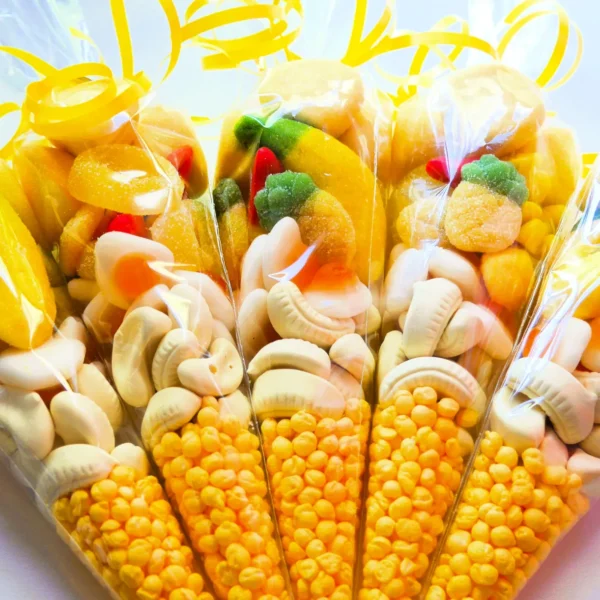 sweet cones packed full of bright cheerful yellow coloured sweets